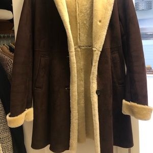 Genuine shearling chocolate brown car coat, size small.